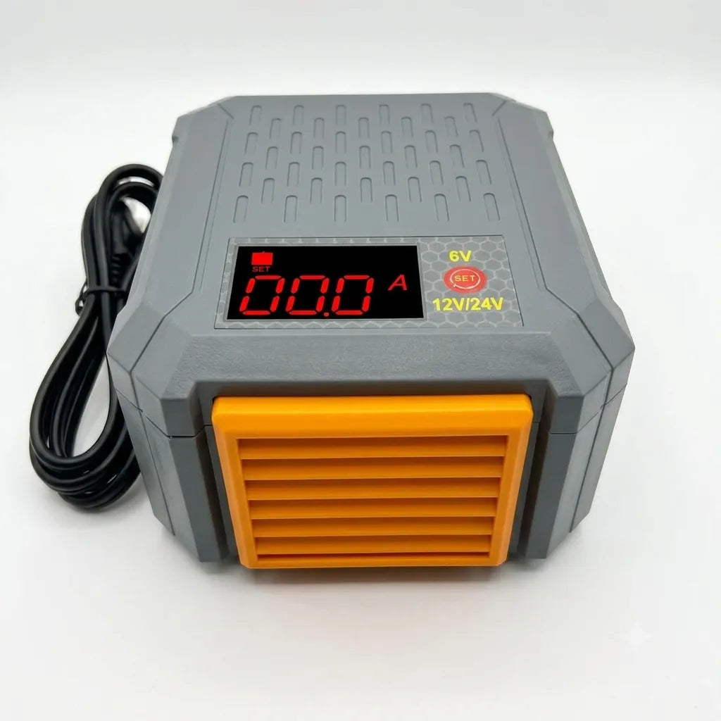 Cargador inverter Demolition MAD-30, vista frontal con pantalla y rejilla naranja